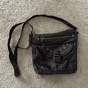 Dark brown cross body purse with light embroidery and multiple pockets